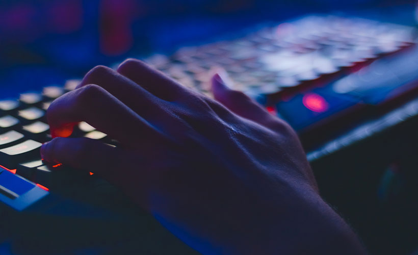 person typing on a computer